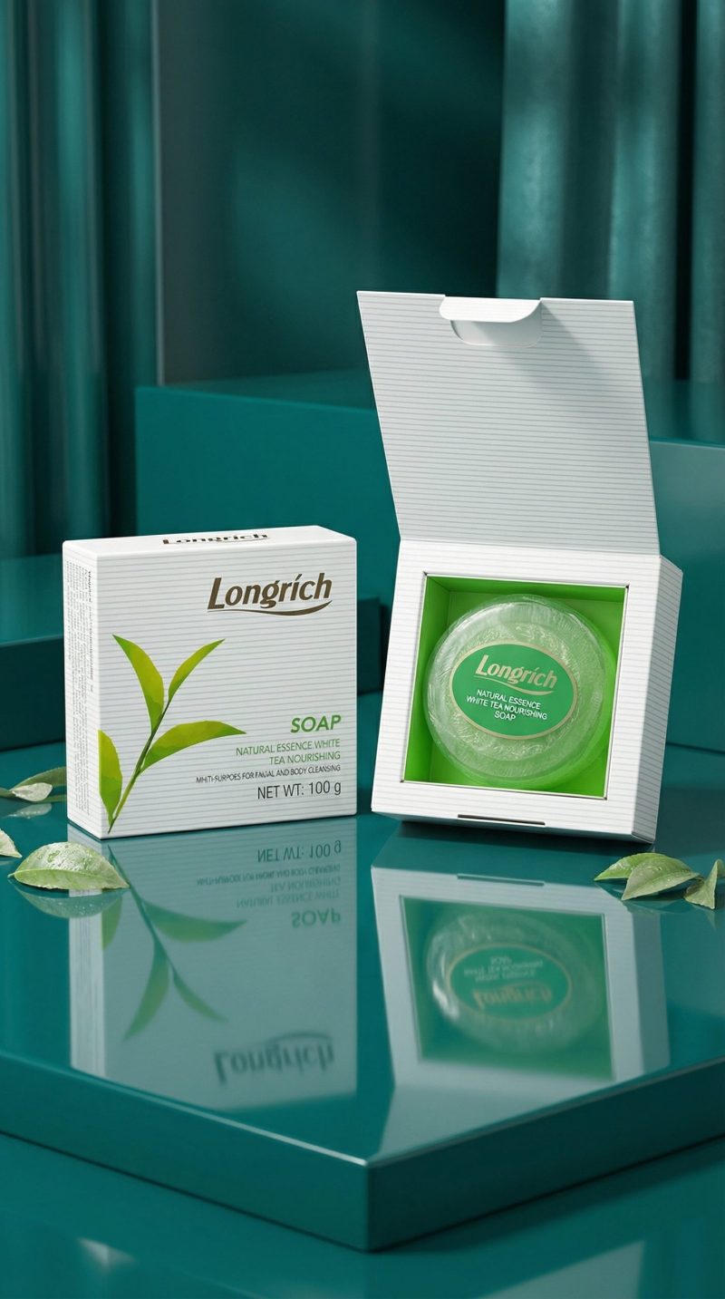 Longrich soap packaging on a reflective teal surface with green leaves.