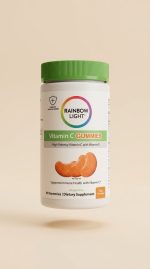 Rainbow Light Vitamin C Gummies supplement bottle on a beige background
