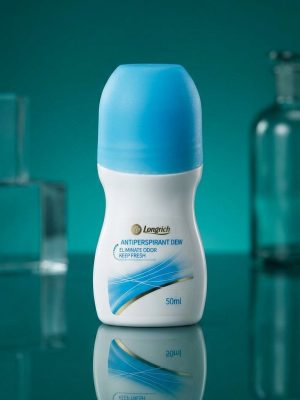 Roll-on deodorant bottle with blue cap on a reflective surface against a teal background